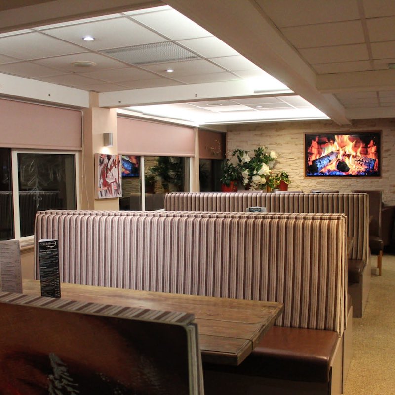 Dining at Ocean Views with a sea view